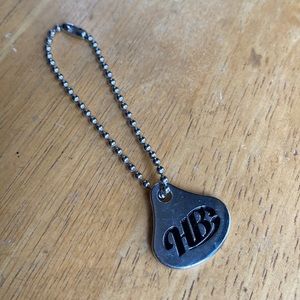 HB charm or Keychain in good condition 3,4”